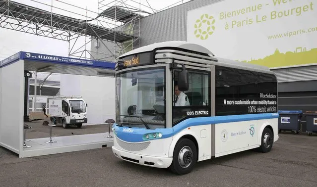 A small electric bus is seen on the site of the World Climate Change Conference 2015 (COP21) in Le Bourget, near Paris, France, November 29, 2015. (Photo by Jacky Naegelen/Reuters)