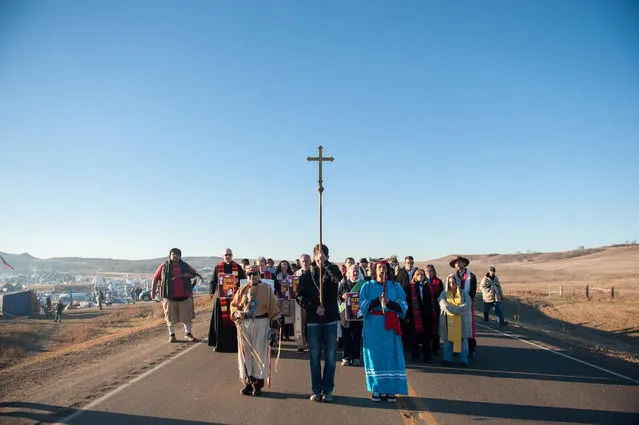 Members of the clergy from across the United States participate in a march during a protest of the Dakota Access pipeline near the Standing Rock Indian Reservation near Cannonball, North Dakota November 3, 2016. (Photo by Stephanie Keith/Reuters)