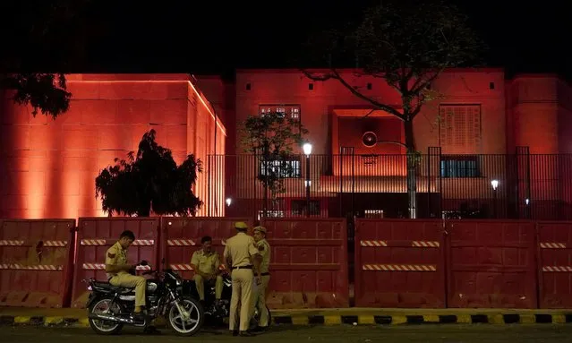 Delhi Police personnel stand guard outside the site of the new parliament building ahead of its inauguration in New Delhi, India on May 27, 2023. (Photo by Mayank Makhija/NurPhoto via Getty Images)