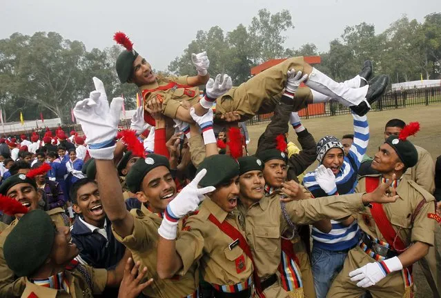 Cadets from the National Cadet Corps (NCC) celebrate after being awarded third position in the best marching trophy competition during the Republic Day celebrations in the northern Indian city of Chandigarh January 26, 2015. (Photo by Ajay Verma/Reuters)