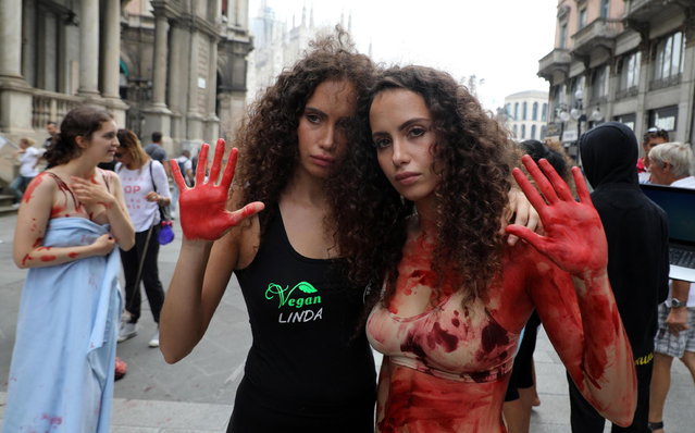 Animal rights activists protest against the use of animal leather in fashion businness, a few days before the fashion week opening in Milan, Italy, 16 September 2018. (Photo by Matteo Bazzi/EPA/EFE)