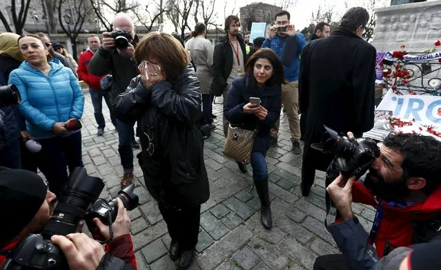 A tourist from Germany cries as she visits the site of Tuesday's suicide bomb attack at Sultanahmet square in Istanbul, Turkey January 14, 2016. (Photo by Murad Sezer/Reuters)