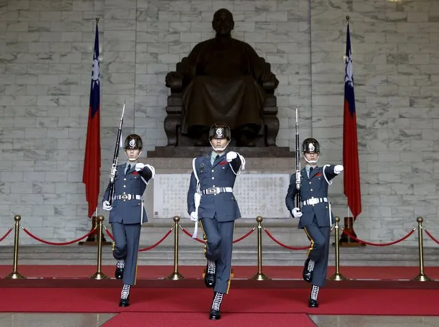 Guards of honour parade at the Chiang Kai-shek Memorial Hall in Taipei, Taiwan, January 17, 2016. (Photo by Olivia Harris/Reuters)