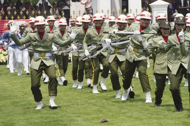 Indonesian soldiers perform during a ceremony marking the country's 78th anniversary of independence at Merdeka Palace in Jakarta, Indonesia, Thursday, August 17, 2023. (Photo by Achmad Ibrahim/AP Photo)