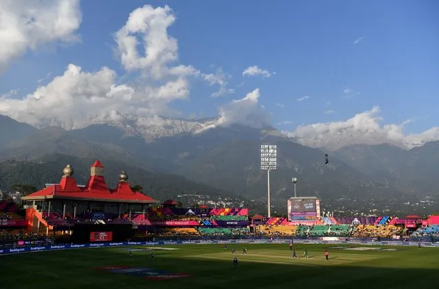 General view of play as mountains are seen in the background inside the stadium during the ICC Men's Cricket World Cup India 2023 between England and Bangladesh at HPCA Stadium on October 10, 2023 in Dharamsala, India. (Photo by Gareth Copley/Getty Images)