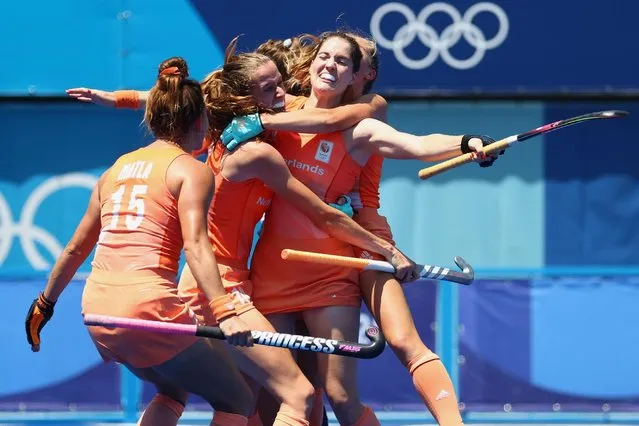 Marloes Keetels of the Netherlands celebrates with teammates after scoring the team's fourth goal against Britain during their women's semi-final match of the Tokyo 2020 Olympic Games field hockey competition, at the Oi Hockey Stadium in Tokyo, on August 4, 2021. (Photo by Bernadett Szabo/Reuters)