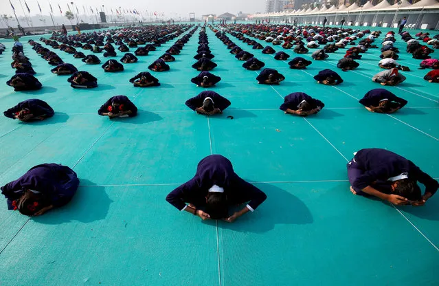 School children attend a yoga session in Ahmedabad, India, January 5, 2019. (Photo by Amit Dave/Reuters)