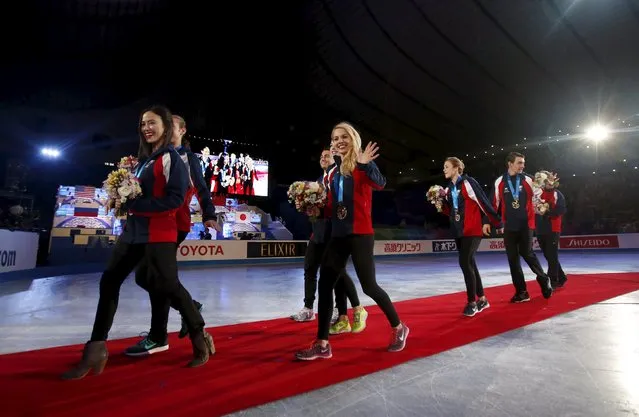 Team U.S. leave the ice rink after a medal ceremony at the ISU World Team Trophy in Figure Skating in Tokyo April 18, 2015. (Photo by Yuya Shino/Reuters)