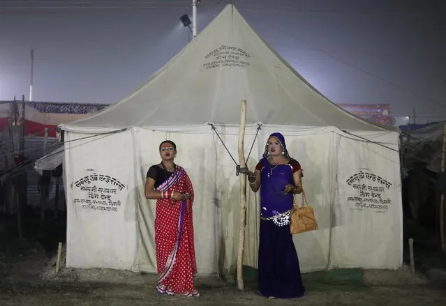 Members of the “Kinnar Akhara” congregation for transgender people, pose for a picture inside their camp at “Kumbh Mela”, or the Pitcher Festival, in Prayagraj, previously known as Allahabad, India, February 2, 2019. (Photo by Anushree Fadnavis/Reuters)