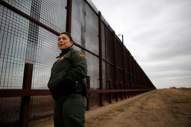 U.S. Border patrol agent Erika King stands next to the border fence separating the United States and Mexico before an interview with Reuters in El Paso, U.S. January 17, 2017. (Photo by Tomas Bravo/Reuters)