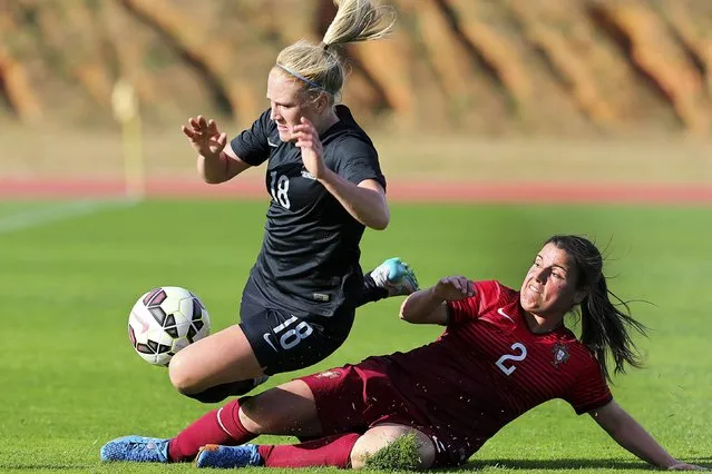 New Zealand's Catherine Bott (L) in action against Portugal's Monica Mendes (R) during the Algarve Cup 2016 soccer match between Portugal and New Zealand in Albufeira, southern Portugal, 07 March 2016. (Photo by Luis Forra/EPA)