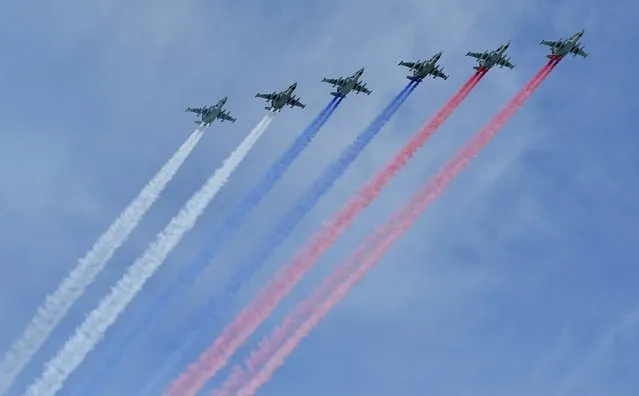 Russian Sukhoi Su-25 Frogfoot ground-attack planes fly in formation over the Red Square during the Victory Day parade in Moscow, Russia, May 9, 2015. (Photo by Reuters/Host Photo Agency/RIA Novosti)