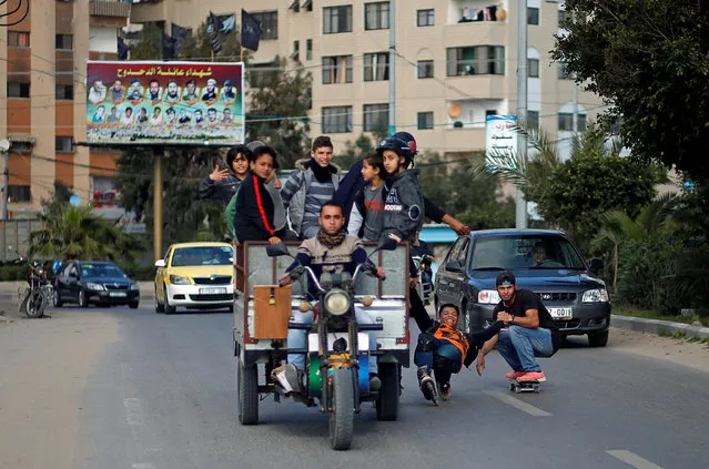 Members of Gaza Skating Team, Mohammad Al-Sawalhe, 23, and Mustafa Sarhan, 19, practice their rollerblading and skating skills on a street in Gaza City March 10, 2019. (Photo by Mohammed Salem/Reuters)