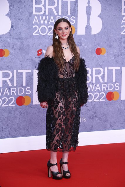 British singer-songwriter Holly Humberstone poses for photographers upon arrival at the Brit Awards 2022 in London Tuesday, Feb. 8, 2022. (Photo by Joel C. Ryan/Invision/AP Photo)