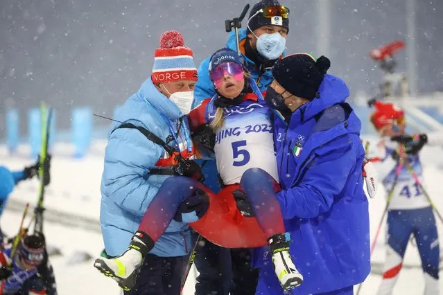 Ingrid Landmark Tandrevold of Norway in the finish during the women´s biathlon pursuit during the Beijing 2022 Winter Olympics at National Biathlon Centre on February 13, 2022 in Zhangjiakou, China. (Photo by Hannah Mckay/Reuters)