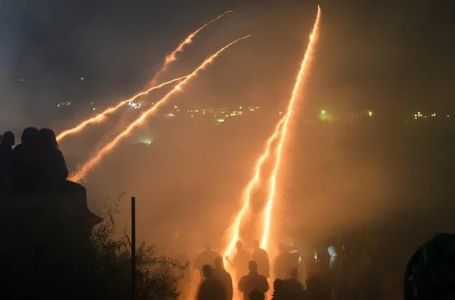 Supporters of the Panaghia Erithiani Church fire rockets from home-made racks at the Aghios Marko Church during the annual Rocket War, known locally as the “Rouketopolemos”, on April 15, 2017 in Chios, Greece. (Photo by Leon Neal/Getty Images)