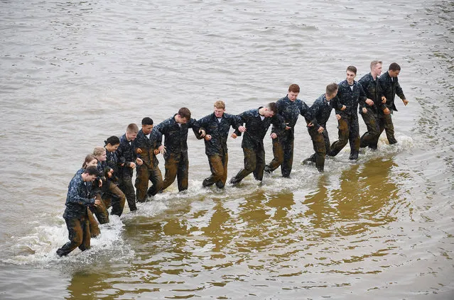 United States Naval Academy plebes take part in the “Wet and Sandy” portion of Sea Trials at the United States Naval Academy on Tuesday May 17, 2016 in Annapolis, MD. (Photo by Matt McClain/The Washington Post)