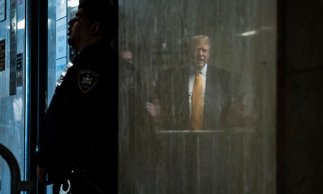 Former President Donald Trump, (Reflection) speaks to reporters as jurors are released to begin deliberations for his criminal trial at the Manhattan Criminal Court in New York, NY, USA, 29 May 2024. Trump was charged with 34 counts of falsifying business records last year, which prosecutors say was an effort to hide a potential s*x scandal, both before and after the 2016 presidential election. Trump is the first former U.S. president to face trial on criminal charges. (Photo by Jabin Botsford/UPI/Rex Features/Shutterstock)