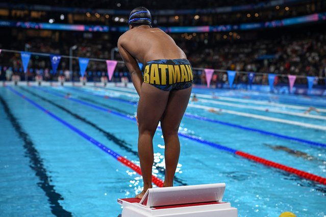 A photo shows the batman swimsuit of an athlete during warm up ahead of a heats session of the swimming event during the Paris 2024 Olympic Games at the Paris La Defense Arena in Nanterre, west of Paris, on August 1, 2024. (Photo by Oli Scarff/AFP Photo)