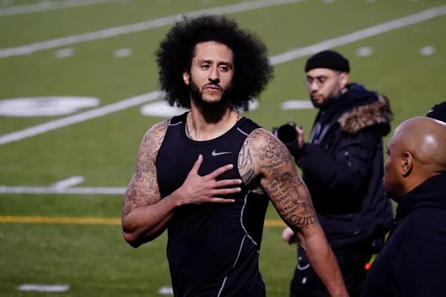Colin Kaepernick puts his hand over his heart in response to a comment at a special training event at Charles. R. Drew High School in Riverdale, Georgia, November 16, 2019. (Photo by Elijah Nouvelage/Reuters)
