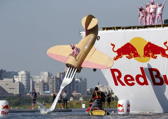 A participant attempts to control a craft during the Red Bull Flugtag Russia 2015 competition in Moscow, Russia, July 26, 2015. (Photo by Sergei Karpukhin/Reuters)