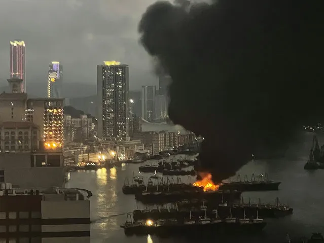Smoke rises as ships are engulfed by fire on April 25, 2022 in Macao, China. Ships anchored in sea waters near Macao caught fire on Monday evening. (Photo by VCG/VCG via Getty Images)