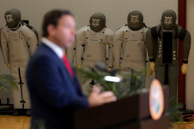 Training dummies are seen as Florida Governor Ron DeSantis speaks during a press conference announcing that Florida law enforcement will launch a criminal investigation of the apparent assassination attempt on Republican presidential nominee and former U.S. President Donald Trump, in West Palm Beach, Florida, U.S. September 17, 2024. (Photo by Marco Bello/Reuters)