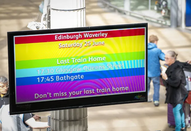Information sign at Edinburgh's Waverley Station during nationwide rail strikes, in Edinburgh, Saturday, June 25, 2022. Train stations are all but deserted across Britain on the third day of a national strike that snarled the weekend plans of millions. Train companies said only a fifth of passenger services would run on Saturday. (Photo by Jane Barlow/PA Wire via AP Photo)