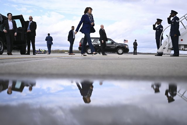 Democratic presidential nominee Vice President Kamala Harris walks to board Air Force Two before departing Dane County Regional Airport in Madison, Wis., Thursday, October 31, 2024. (Photo by Brendan Smialowski/ Pool via AP Photo)