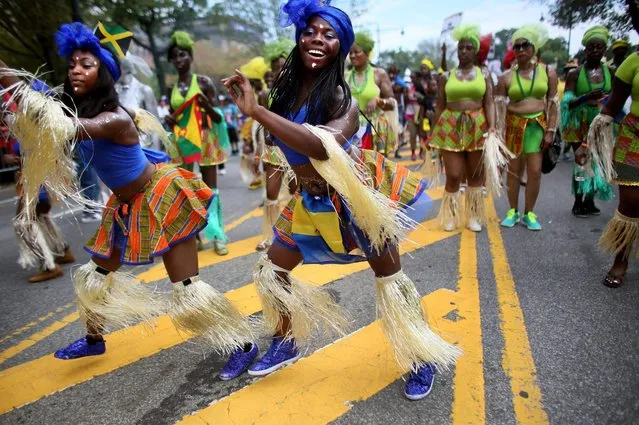 Revelers participate in the annual West Indian Day parade held on September 1, 2014 in the Brooklyn borough of New York City. (Photo by Yana Paskova/Getty Images)