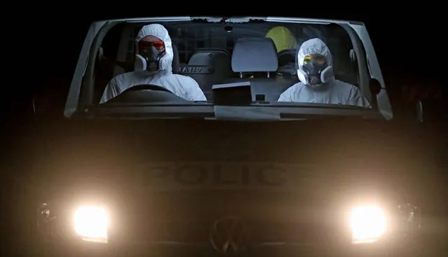 Members of the PSNI Covid-19 Unit at Musgrave Street custody suite in Belfast, Northern Ireland on May 19, 2020. PA Media was given exclusive first access to the Covid-19 block to witness how the Police Service of Northern Ireland (PSNI) has adapted to the challenges of custody in a pandemic. (Photo by Niall Carson/PA Images via Getty Images)