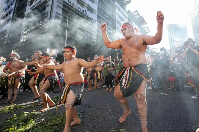 Indigenous dancers perform in the middle of the CBD1 on June 06, 2020 in Brisbane, Australia. Events across Australia have been organised in solidarity with protests in the United States following the killing of an unarmed black man George Floyd at the hands of a police officer in Minneapolis, Minnesota and to rally against aboriginal deaths in custody in Australia. (Photo by Jono Searle/Getty Images)
