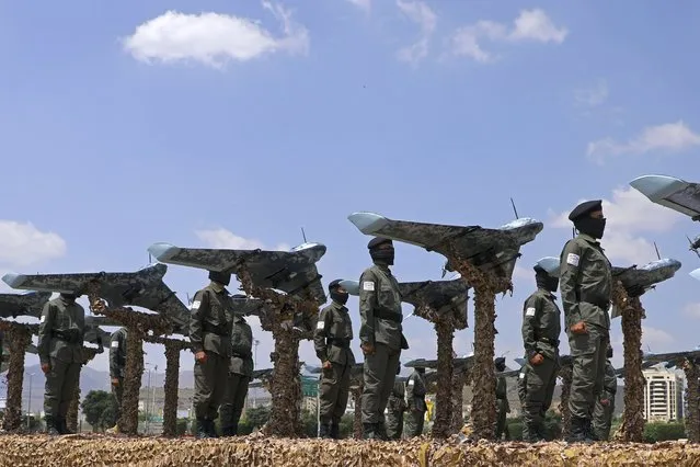 A military parade displaying Houthi forces and weapons moves through a main street of Sanaa, Yemen, on September 21, 2022. Yemen's warring parties face a deadline to renew a 6-month-long truce on Sunday, Oct. 2. (Photo by Ansar Allah Media via AP Photo)