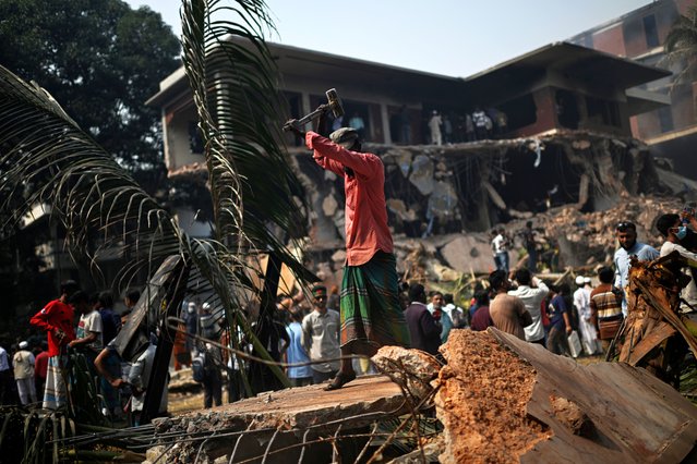 A man hammers the debris around the vandalized residence of Sheikh Mujibur Rahman, Bangladesh's former leader and the father of the country's ousted Prime Minister Sheikh Hasina, in Dhaka in Dhaka, Bangladesh, Thursday, February 6, 2025. (Photo by Mahmud Hossain Opu/AP Photo)