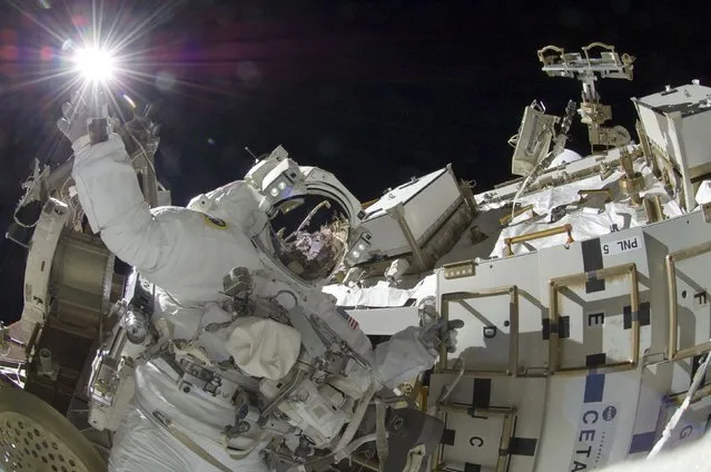 NASA astronaut Sunita Williams, Expedition 32 flight engineer, takes part in the mission's third session of extravehicular activity outside the International Space Station on September 5, 2012, in this NASA handout image. (Photo by Reuters/NASA)