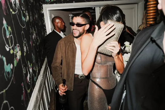 American model Kendall Jenner hides from the camera as she arrives with Puerto Rican rapper Bad Bunny to Richie Akiva's “The After” party hosted by Diddy and Doja Cat at The Box, presented by Armand de Brignac and CIROC Vodka on May 1, 2023. (Photo by Rommel Demano/BFA.com)