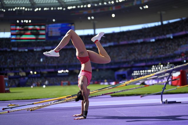 Anicka Newell, of Canada, prepares for the women's pole vault qualification at the 2024 Summer Olympics, Monday, August 5, 2024, in Saint-Denis, France. (Photo by Bernat Armangue/AP Photo)