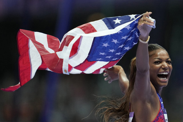 Gabrielle Thomas, of the United States, celebrates winning the gold medal in the women's 200 meters final at the 2024 Summer Olympics, Tuesday, August 6, 2024, in Saint-Denis, France. (Photo by Ashley Landis/AP Photo)