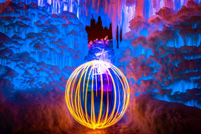 Fire ball in the ice castle. (Photo by Sam Scholes/Caters News)