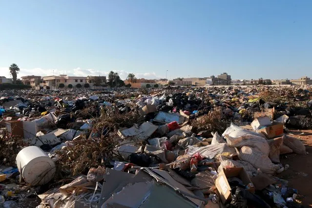 Garbage is pictured piled on a street during an on-going strike by cleaning companies' employees over the non-payment of several months of wages in Benghazi, Libya, December 7, 2015. (Photo by Esam Omran Al-Fetori/Reuters)