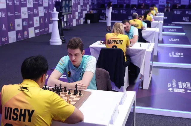Players of Ganges Grandmasters (Yellow Tshirts) play against Chingari Gulf Titans (Blue Tshirts) during Global Chess League in Dubai, United Arab Emirates, 22 June 2023. The Global Chess League runs from 22 June until 02 July 2023. (Photo by Ali Haider/EPA)