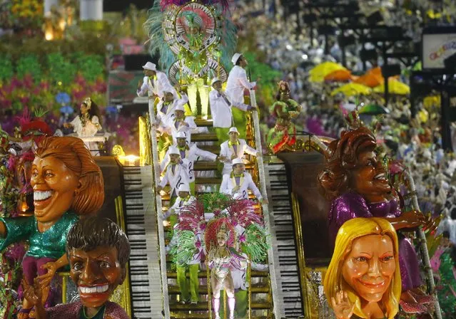Revellers from the Mangueira samba school participate in the annual carnival parade in Rio de Janeiro's Sambadrome, February 15, 2015. (Photo by Ricardo Moraes/Reuters)