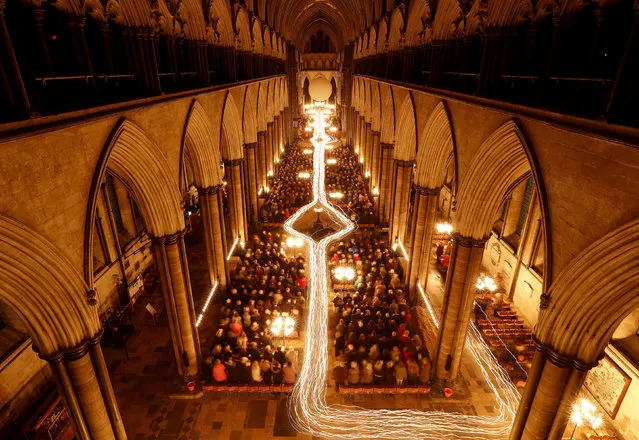 Salisbury Cathedral celebrates the beginning of Advent with a candle-lit service and procession, “From Darkness to Light” in Salisbury, Britain, November 30, 2018. (Photo by Peter Nicholls/Reuters)