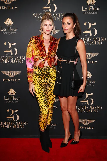 Devon Windsor and Helena Christensen attend What Goes Around Comes Around 25th Anniversary Celebration At The Versace Mansion With a Retrospective Tribute To Gianni Versace on December 08, 2018 in Miami Beach, Florida. (Photo by Astrid Stawiarz/Getty Images for What Goes Around Comes Around)