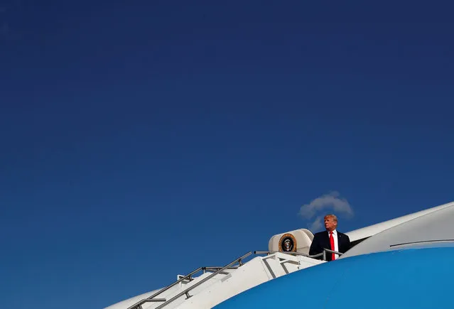 U.S. President Donald Trump boards Air Force One for travel to Ohio at the Morristown Airport in Morristown, New Jersey, August 4, 2018. (Photo by Leah Millis/Reuters)