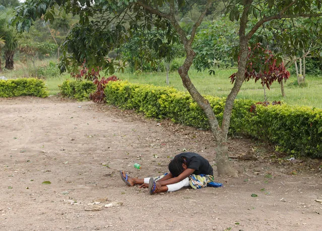 The mother of a baby suspected of dying from Ebola, cries outside a hospital in Beni, North Kivu Province of Democratic Republic of Congo, December 15, 2018. (Photo by Goran Tomasevic/Reuters)