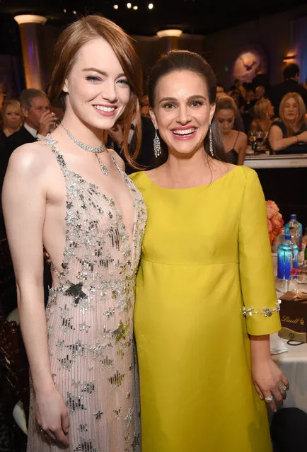 Actresses Emma Stone (L) and Natalie Portman attend the 74th Annual Golden Globe Awards at The Beverly Hilton Hotel on January 8, 2017 in Beverly Hills, California. (Photo by Michael Kovac/Getty Images)
