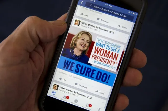 A mobile phone shows a Facebook page of campaign propaganda to promote Hillary Clinton as president in 2016, in this photo illustration taken April 13, 2015. By one estimate U.S. online political advertising could quadruple to nearly $1 billion in the 2016 election, creating huge opportunities for digital strategy firms eager to capitalize on a shift from traditional mediums like television. (Photo by Mike Segar/Reuters)