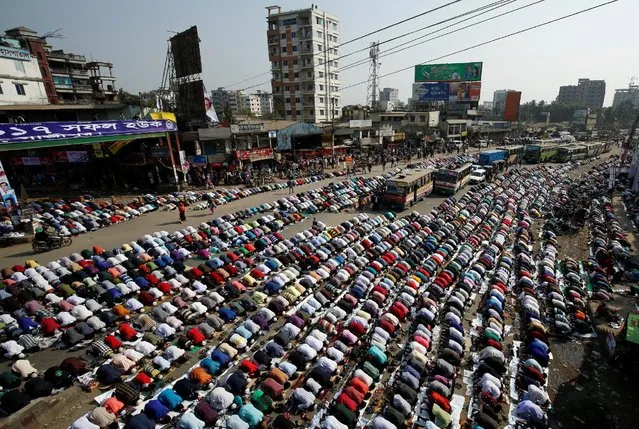 Devotees perform Friday prayers during the Biswa Ijtema in Dhaka, Bangladesh January 13, 2017. (Photo by Mohammad Ponir Hossain/Reuters)