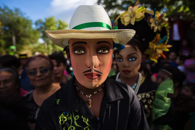 A man dressed as a traditional character in the “Baile de Negras” dance poses for a picture on the feast day of the Virgin of the Candelaria (Candlemas) in the town of Diriomo, some 45 km from Managua, Nicaragua on February 2, 2017 Candlemas falls forty days after Christmas and is celebrated by Catholics as the presentation of Christ at the Temple. (Photo by Inti Ocon/AFP Photo)